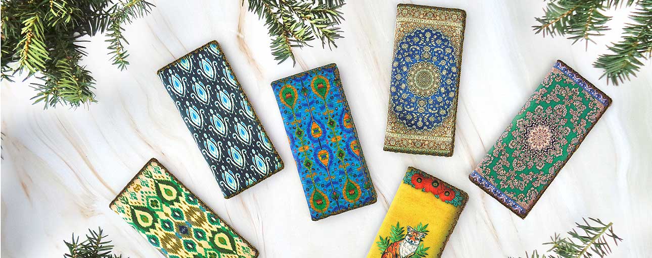 Mlavi design & wholesale unique, beautiful & whimsical vegan large flat wallets to gift shops, boutiques & book stores in Canada, USA and worldwide.